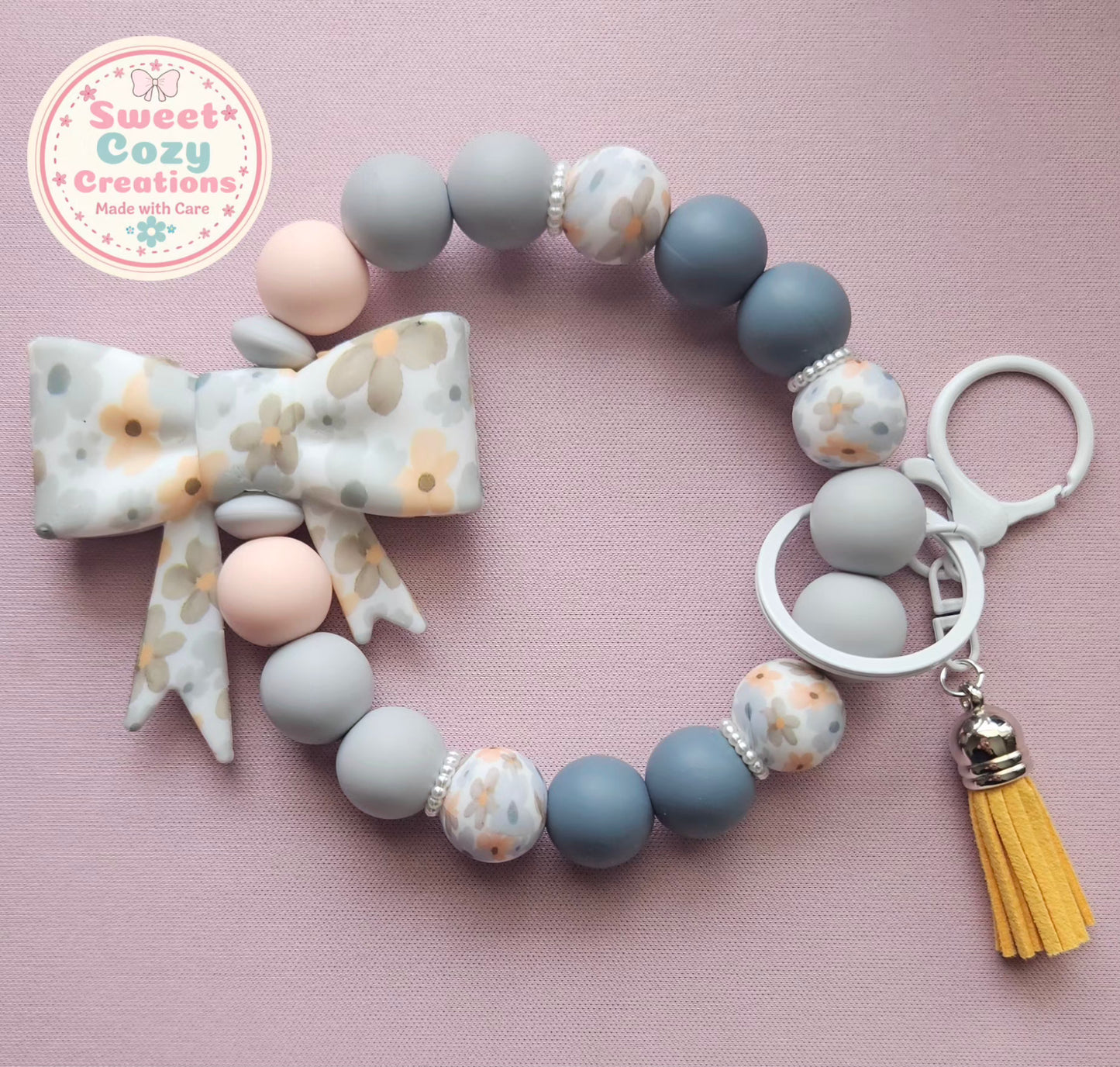 Grey and peach flower Bow Wristlet