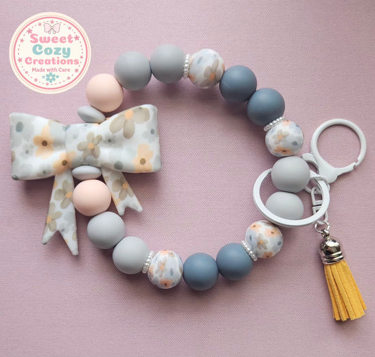 Grey and peach flower Bow Wristlet